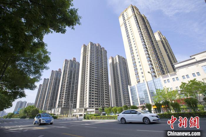 資料圖：車輛從一樓盤前經(jīng)過(guò)。 <a target='_blank' href='/'><p  align=
