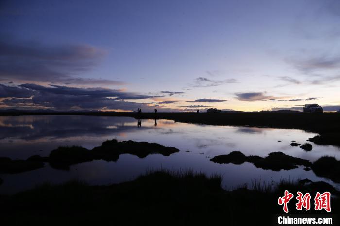 圖為夕陽(yáng)下的查旦濕地?！●R銘言 攝